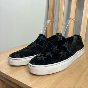 The Flexx black leather slip on sneakers with star design 7